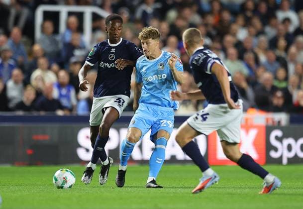 Victor Torp of Coventry City and Raees Bangura-Williams of Millwall Millwall v Coventry City, EFL Carabao Cup, Second Round, Football, The Den, London, UK - 26 Aug 2025London The Den United Kingdom EDITORIAL USE ONLY No use with unauthorised audio, video, data, fixture lists, club league logos or live services. Online in-match use limited to 120 images, no video emulation. No use in betting, games or single club league player publications. Copyright: xMichaelxZemanek Shutterstockx 15455833cc