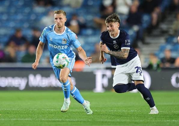 Jamie Allen of Coventry City and Luke Cundle of Millwall Millwall v Coventry City, EFL Carabao Cup, Second Round, Football, The Den, London, UK - 26 Aug 2025London The Den United Kingdom EDITORIAL USE ONLY No use with unauthorised audio, video, data, fixture lists, club league logos or live services. Online in-match use limited to 120 images, no video emulation. No use in betting, games or single club league player publications. Copyright: xMichaelxZemanek Shutterstockx 15455833cm