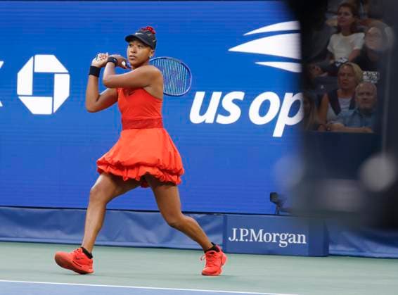 Naomi Osaka of Japan returns a ball in the first set of first round match against Greet Minnen of Belgium in Louis Armstrong Stadium on day 3 at the 2025 US Open Tennis Championship at the USTA Billie Jean King National Tennis Center in New York City on Tuesday, August 26, 2025.  NYP20250826144 JOHNxANGELILLO