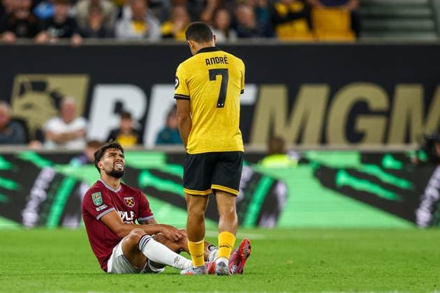 Wolverhampton Wanderers v West Ham United - Carabao Cup Second Round West Ham s Lucas Paqueta grimaces as he looks up at Wolverhampton Wanderers Andre during the Carabao Cup match between Wolverhampton Wanderers and West Ham United at Molineux in Wolverhampton, United Kingdom, on August 26, 2025. Wolverhampton West Midlands United Kingdom  Copyright: xMIxNewsx originalFilename:fletcher-wolverha250826_npMoi.jpg
