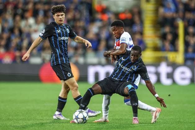 Rangers Jayden Meghoma and Club s Carlos Forbs fight for the ball during a soccer game between Belgian Club Brugge KV and Scottish Glasgow Rangers F.C., Wednesday 27 August 2025 in Brugge, the return leg of the play-offs for the Champions League tournament. Club won the first leg 1-3. BRUNOxFAHY  x132597933x