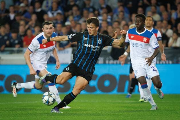 Club s Christos Tzolis and Rangers James Tavernier fight for the ball during a soccer game between Belgian Club Brugge KV and Scottish Glasgow Rangers F.C., Wednesday 27 August 2025 in Brugge, the return leg of the play-offs for the Champions League tournament. Club won the first leg 1-3. KURTxDESPLENTER  x132598246x