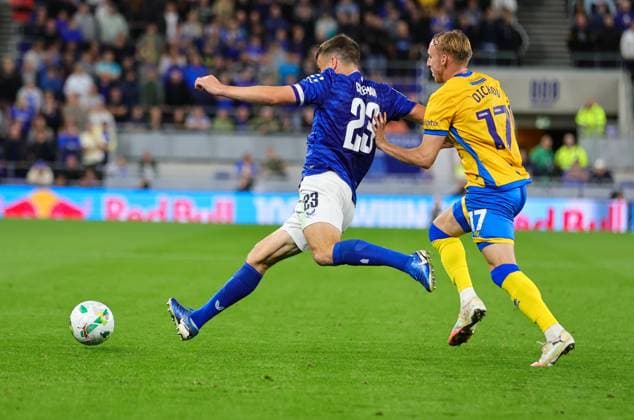 27th August 2025; Hill Dickinson Stadium, Liverpool, England; EFL Carabao Cup Football, Everton versus Mansfield Town; Seamus Coleman of Everton FC is tracked by Max Dickov of Mansfield Town  RogerxEvans