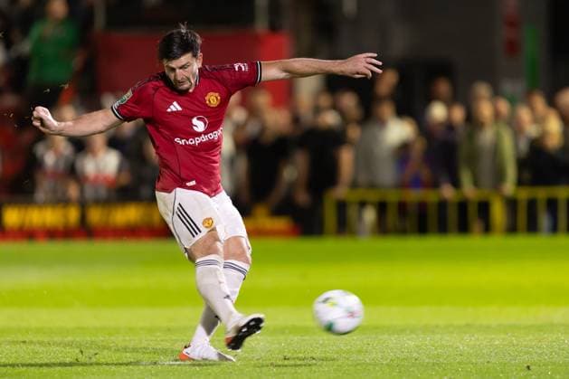 Grimsby Town FC v Manchester United, ManU EFL Cup 27 08 2025. Harry Maguire of Manchester United takes a penalty during the EFL Cup match between Grimsby Town FC and Manchester United at Blundell Park, Grimsby, United Kingdom on 27 August 2025. Editorial use only DataCo restrictions apply See www.football-dataco.com , Copyright: xJezxTighex PSI-22699-0162