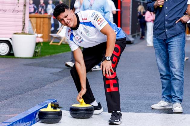 Isack Hadjar of France and Racing Bulls play curling prior to the start of the Formula 1 Heineken Dutch Grand Prix 2025 at Circuit Zandvoort on August 28, 2025 in Zandvoort, Netherlands. (Photo by Marcel ter Bals DeFodi Images)