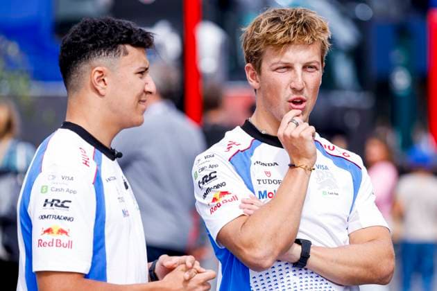 Liam Lawson of New Zealand and Racing Bulls looks on and Isack Hadjar of France and Racing Bulls prior to the start of the Formula 1 Heineken Dutch Grand Prix 2025 at Circuit Zandvoort on August 28, 2025 in Zandvoort, Netherlands. (Photo by Marcel ter Bals DeFodi Images)