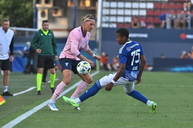From left Jens Stryger of Malmo, Simion Michez of Olomouc in action during the Football European League 4th qualifying round return match: Sigma Olomouc vs Malmo in Olomouc, Czech Republic, August 28, 2025. (CTKxPhoto LudekxPerina) CTKPhotoP2025082807179  CTKPhotoP2025082807179