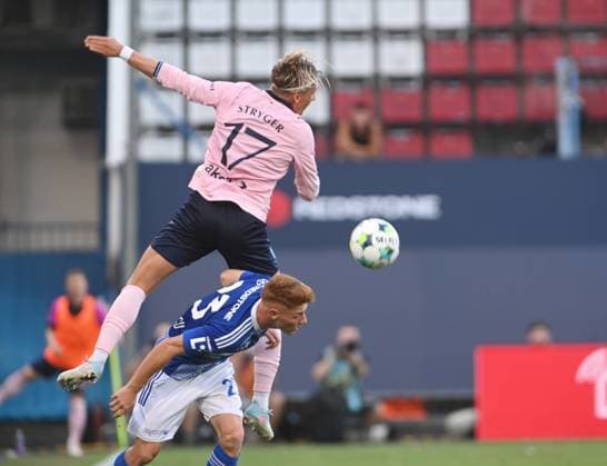 Jens Stryger of Malmo (up) and Andres Dumitrescu of Olomouc in action during the Football European League 4th qualifying round return match: Sigma Olomouc vs Malmo in Olomouc, Czech Republic, August 28, 2025. (CTKxPhoto LudekxPerina) CTKPhotoP2025082807898  CTKPhotoP2025082807898