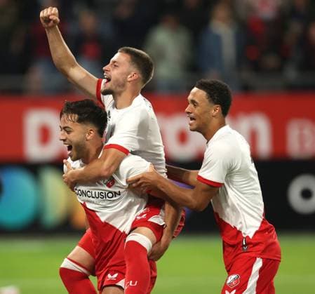 Souffian El Karouani of FC Utrecht with Dave van den Berg of FC Utrecht and Adrian Blake of FC Utrecht celebrate after reaching Europa League after the match FC Utrecht - Zrinjski at the Galgenwaard for the Europa League (play-off) season 2024-2025 in Utrecht, Netherlands on 28 august 2025, (photo by Peter Lous EYE4images DeFodi Images)