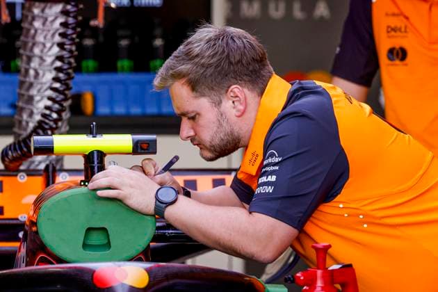 McLaren F1 team mechanics working on the car of Lando Norris in the pit box during the Formula 1 Heineken Dutch Grand Prix 2025 on Day 1 at Circuit Zandvoort on August 29, 2025 in Zandvoort, Netherlands. (Photo by Marcel ter Bals DeFodi Images)