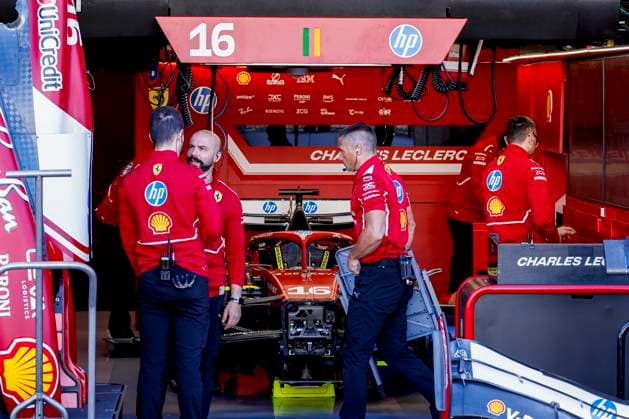 Scuderia Ferrari mechanics working on the car of Charles Leclerc in the pit box during the Formula 1 Heineken Dutch Grand Prix 2025 on Day 1 at Circuit Zandvoort on August 29, 2025 in Zandvoort, Netherlands. (Photo by Marcel ter Bals DeFodi Images)
