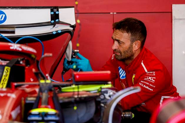 Scuderia Ferrari mechanics working on the car of Charles Leclerc in the pit box during the Formula 1 Heineken Dutch Grand Prix 2025 on Day 1 at Circuit Zandvoort on August 29, 2025 in Zandvoort, Netherlands. (Photo by Marcel ter Bals DeFodi Images)