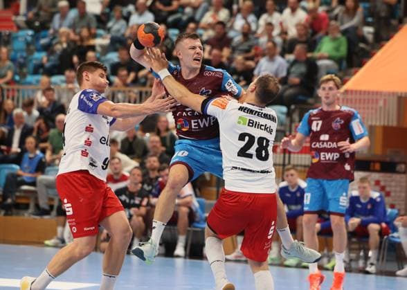 GER HBL2 Saison 2025 2026 VfL Potsdam vs HBW Balingen Weilstetten, 29.08.25, MBS Arena, Potsdam Georg PÖHLE (HBW Balingen-Weilstetten 94), Marco MENGON (1.VfL Potsdam 30), Tobias HEINZELMANN (HBW Balingen-Weilstetten 28), Dustin KRAUS (1.VfL Potsdam 47)