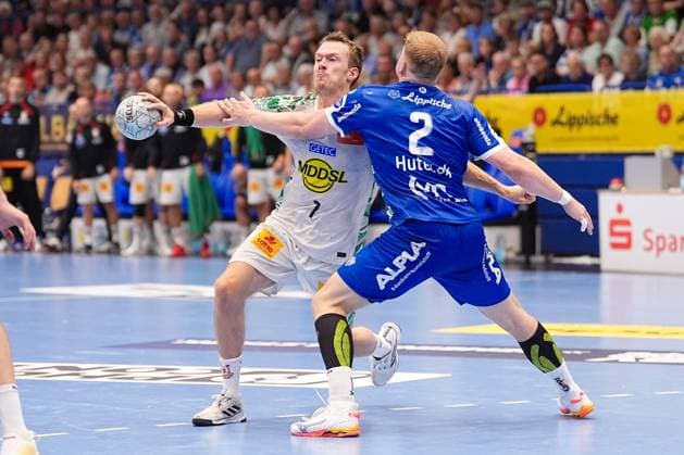 29.08.2025, xydrx, Handball, 1.HBL, TBV Lemgo Lippe - SC Magdeburg, PHOENIX Contact-Arena: Felix Claar (SC Magdeburg 7) im Zweikampf gegen Lukas Hutecek (TBV Lemgo Lippe 2) Nordrhein-Westfahlen Deutschland