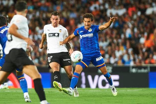 Baptiste Santamaria (Valencia CF) and Lusi Milla (Getafe CF) during the LaLiga EA Sports match between Valencia CF and Getafe CF at Estadio de Mestalla on August 29, 2025 in Valencia, Spain. (Photo by Maria Jose Segovia DeFodi Images)