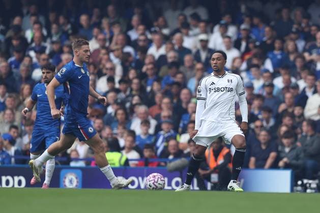 30th August 2025; Stamford Bridge, Chelsea, London, England: Premier League Football, Chelsea versus Fulham; Kenny Tete of Fulham passes past Liam Delap of Chelsea  KatiexChan