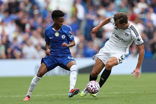 30th August 2025; Stamford Bridge, Chelsea, London, England: Premier League Football, Chelsea versus Fulham; Estevao of Chelsea is tackled by Sander Berge of Fulham  KatiexChan