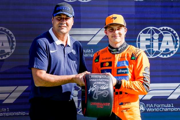 Julio Ricardo Cruz of Argentina and Pole position qualifier Oscar Piastri of Australia and McLaren F1 Team with pole postion award competing in the Qualification of the Formula 1 Heineken Dutch Grand Prix 2025 on Day 2 at Circuit Zandvoort on August 30, 2025 in Zandvoort, Netherlands. (Photo by Marcel ter Bals DeFodi Images)