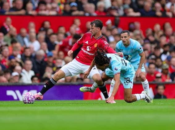 30th August 2025; Old Trafford, Manchester, England; Premier League Football, Manchester United, ManU versus Burnley;Mason Mount of Manchester United under pressure from Hannibal Mejbri of Burnley  RogerxEvans