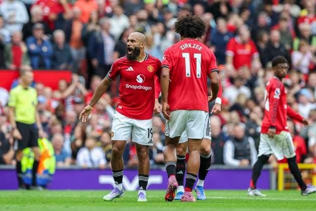 Manchester United, ManU FC v Burnley FC, English Premier League Manchester United forward Bryan Mbeumo (19) scores a GOAL 2-1 and celebrates with Manchester United forward Joshua Zirkzee (11) during the Manchester United FC v Burnley FC English Premier League match at Old Trafford, Manchester, England, United Kingdom on 30 August 2025 Credit: Phil Duncan Every Second Media Editorial use only. All images are copyright Every Second Media Limited. No images may be reproduced without prior permission. All rights reserved. Premier League and Football League images are subject to licensing agreements with Football DataCo Limited. see https: www.football-dataco.com Copyright: xIMAGO EveryxSecondxMediax ESM-1572-0106 PhilxDuncanx xEveryxSecondxMediax