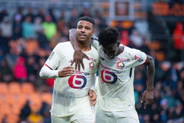 FOOTBALL : Lorient vs Lille - Ligue 1 - 30 08 2025 Hamza Igmane ( 29 - Lille ) celebrates with Felix Correia ( 27 - Lille ) during the Ligue 1 match between FC Lorient and Lille OSC at Stade Yves Allainmat on August 30, 2025 in Lorient, France. ( Photo by Federico Pestellini PsnewZ ) - LorientFrance  Copyright: xFedericoxPestellinix