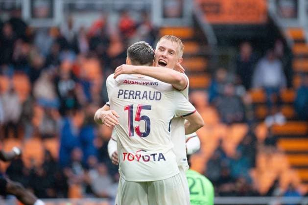 FOOTBALL : Lorient vs Lille - Ligue 1 - 30 08 2025 Hakon Haraldsson ( 10 - Lille ) celebrates with Romain Perraud ( 15 - Lille ) during the Ligue 1 match between FC Lorient and Lille OSC at Stade Yves Allainmat on August 30, 2025 in Lorient, France. ( Photo by Federico Pestellini PsnewZ ) - LorientFrance  Copyright: xFedericoxPestellinix