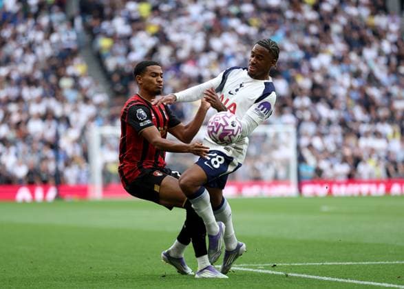 30th August 2025; Tottenham Hotspur Stadium, London, England; Premier League Football, Tottenham Hotspur versus Bournemouth; Amine Adli of AFC Bournemouth challenged by Wilson Odobert of Tottenham Hotspur  JohnxPatrickxFletcher