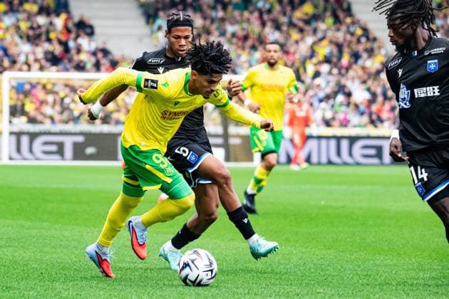 FOOTBALL : FC Nantes vs AJ Auxerre - Ligue 1 - JournÃ e 3 - 30 08 2025 Yassine Benhattab (FC NANTES) Kevin Danois (AJ Auxerre) NantesFrance  Copyright: xBaptistexAutissierx
