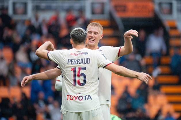 FOOTBALL : Lorient vs Lille - Ligue 1 - 30 08 2025 Hakon Haraldsson ( 10 - Lille ) celebrates with Romain Perraud ( 15 - Lille ) during the Ligue 1 match between FC Lorient and Lille OSC at Stade Yves Allainmat on August 30, 2025 in Lorient, France. ( Photo by Federico Pestellini PsnewZ ) - LorientFrance  Copyright: xFedericoxPestellinix