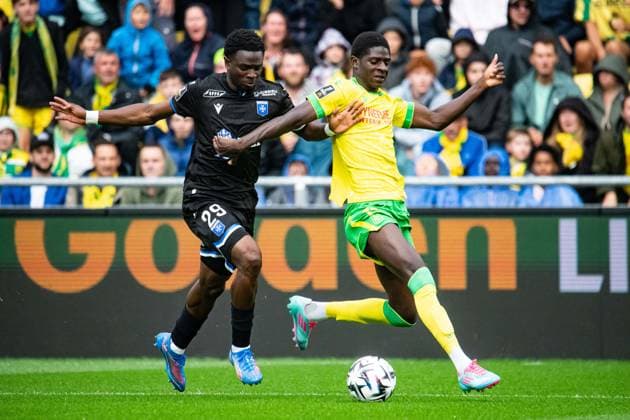 FOOTBALL : FC Nantes vs AJ Auxerre - Ligue 1 - JournÃ e 3 - 30 08 2025 Herba Guirassy (FC NANTES) Marvin Senaya (AJ Auxerre) NantesFrance  Copyright: xBaptistexAutissierx