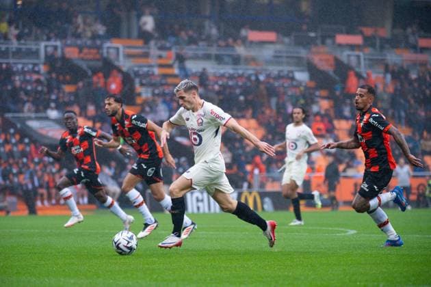FOOTBALL : Lorient vs Lille - Ligue 1 - 30 08 2025 Romain Perraud ( 15 - Lille ) scores a goal during the Ligue 1 match between FC Lorient and Lille OSC at Stade Yves Allainmat on August 30, 2025 in Lorient, France. ( Photo by Federico Pestellini PsnewZ ) - LorientFrance  Copyright: xFedericoxPestellinix
