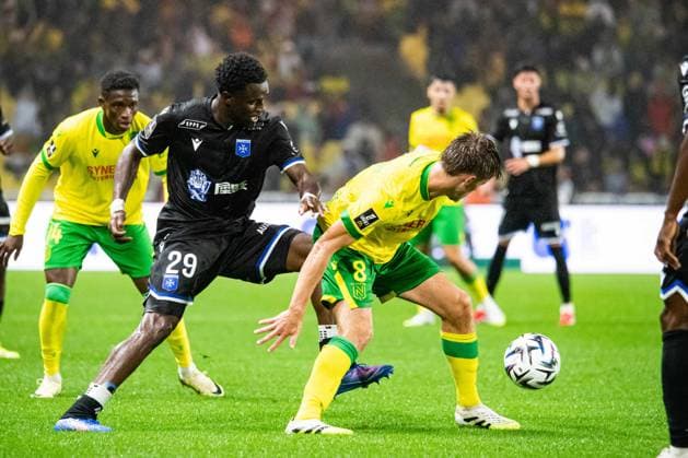 FOOTBALL : FC Nantes vs AJ Auxerre - Ligue 1 - JournÃ e 3 - 30 08 2025 Marvin Senaya (AJ Auxerre) Johann Lepenant (FC NANTES) NantesFrance  Copyright: xBaptistexAutissierx