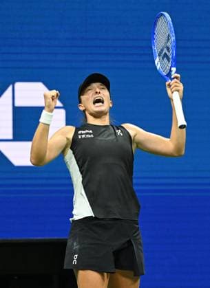 Iga Swiatek of Pol reacts after defeating Anna Kalinskya on Arthur Ashe Stadium on day 7 at the 2025 US Open Tennis Championship at the USTA Billie Jean King National Tennis Center in New York City on Thursday, August 30, 2025.  NYP20250830304 LARRYxMARANO