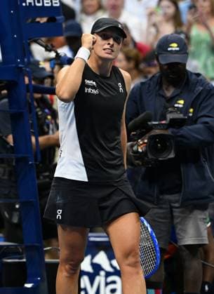 Iga Swiatek of Pol reacts after defeating Anna Kalinskya on Arthur Ashe Stadium on day 7 at the 2025 US Open Tennis Championship at the USTA Billie Jean King National Tennis Center in New York City on Saturday, August 30, 2025.  NYP20250830301 LARRYxMARANO