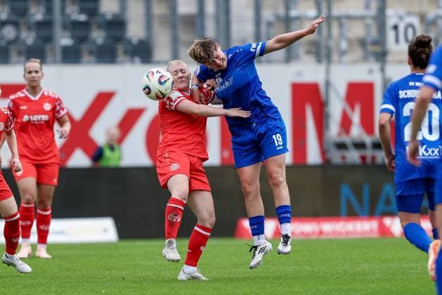 v.li.: Heidrun Sigurdardottir (1. FSV Mainz 05, 8) und Lea Mauly (SV Meppen, 19) im Kopfballduell, Kopfball, Zweikampf, Action, Aktion, Spielszene, DIE DFB-RICHTLINIEN UNTERSAGEN JEGLICHE NUTZUNG VON FOTOS ALS SEQUENZBILDER UND ODER VIDEOÄHNLICHE FOTOSTRECKEN. DFB REGULATIONS PROHIBIT ANY USE OF PHOTOGRAPHS AS IMAGE SEQUENCES AND OR QUASI-VIDEO., 31.08.2025, Meppen (Deutschland), Fussball, 2. Frauen-Bundesliga, SV Meppen - 1. FSV Mainz 05