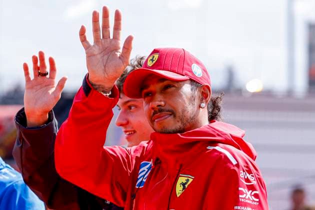 Drivers Parade Lewis Hamilton of the United Kingdom and Scuderia Ferrari HP F1 Team and Andrea Kimi Antonelli of Italy and Mercedes AMG Petronas F1 Team waves during the Formula 1 Heineken Dutch Grand Prix 2025 on Day 3 at Circuit Zandvoort on August 31, 2025 in Zandvoort, Netherlands. (Photo by Marcel ter Bals DeFodi Images)