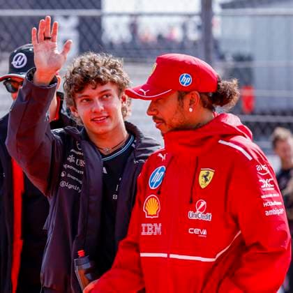 Drivers Parade Andrea Kimi Antonelli of Italy and Mercedes AMG Petronas F1 Team wave and Lewis Hamilton of the United Kingdom and Scuderia Ferrari HP F1 Team looks on during the Formula 1 Heineken Dutch Grand Prix 2025 on Day 3 at Circuit Zandvoort on August 31, 2025 in Zandvoort, Netherlands. (Photo by Marcel ter Bals DeFodi Images)