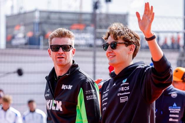 Drivers Parade Nico Hülkenberg of Germany and Stake F1 Team Kick Sauber looks on and George Russell of the United Kingdom and Mercedes AMG Petronas F1 Team wave during the Formula 1 Heineken Dutch Grand Prix 2025 on Day 3 at Circuit Zandvoort on August 31, 2025 in Zandvoort, Netherlands. (Photo by Marcel ter Bals DeFodi Images)