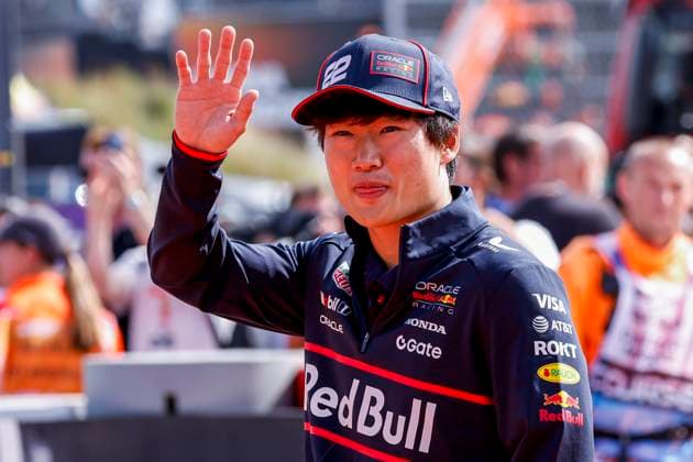 Drivers Parade Yuki Tsunoda of Japan and Oracle Red Bull Racing wave during the Formula 1 Heineken Dutch Grand Prix 2025 on Day 3 at Circuit Zandvoort on August 31, 2025 in Zandvoort, Netherlands. (Photo by Marcel ter Bals DeFodi Images)