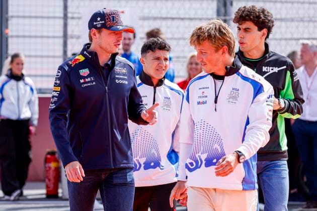 Drivers Parade Max Verstappen of the Netherlands and Oracle Red Bull Racing and Isack Hadjar of France and Visa Cash App Racing Bulls and Liam Lawson of New Zealand and Visa Cash App Racing Bulls and Gabriel Bortoleto of Brazil and Stake F1 Team Kick Sauber looks on during the Formula 1 Heineken Dutch Grand Prix 2025 on Day 3 at Circuit Zandvoort on August 31, 2025 in Zandvoort, Netherlands. (Photo by Marcel ter Bals DeFodi Images)