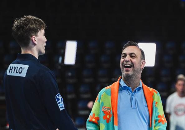 31.08.2025, xlakx, Handball Daikin HBL, Fuechse Berlin - Bergischer HC v.l. Nils Lichtlein (Fuechse Berlin), Bob Hanning (Fuechse Berlin Geschaeftsfuehrer) lachend im Gespraech Berlin
