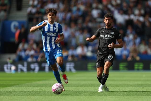 Football - 2025 2026 Premier League - Brighton & Hove Albion vs Manchester City - Amex Stadium - Sunday 31st August 2025 Matheus Nunes of Manchester City and Diego Gomez of Brighton in action during the Premier League match at the Amex Stadium COLORSPORT Shaun Boggust 