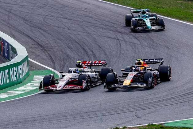 Oliver Bearman of the United Kingdom and Haas F1 Team and Yuki Tsunoda of Japan and Oracle Red Bull Racing batlle during the Formula 1 Heineken Dutch Grand Prix 2025 on Day 3 at Circuit Zandvoort on August 31, 2025 in Zandvoort, Netherlands. (Photo by Marcel ter Bals DeFodi Images)