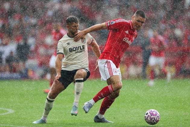 Nottingham, England, 31st August 2025. Nikola Milenkovic of Nottingham Forest holds off Niclas Fullkrug of West Ham United during the Nottingham Forest vs West Ham United Premier League match at the City Ground, Nottingham. Picture credit should read: James Baylis Sportimage EDITORIAL USE ONLY. No use with unauthorised audio, video, data, fixture lists, club league logos or live services. Online in-match use limited to 120 images, no video emulation. No use in betting, games or single club league player publications. SPI_046_JB_Forest_WestHam SPI-4100-0046