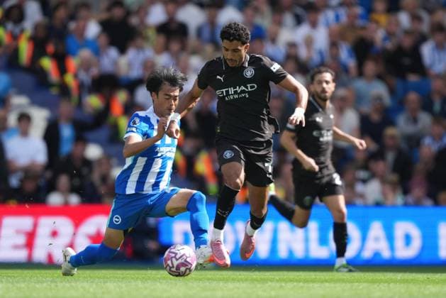Brighton and Hove Albion v Manchester City, Premier League, Football, Amex Stadium, Brighton, UK - 31 Aug 2025 Kaoru Mitoma of Brighton & Hove Albion and Omar Marmoush of Manchester City. Brighton Amex Stadium Brighton UK, UK NEWSPAPERS OUT Copyright: xSeanxRyanx