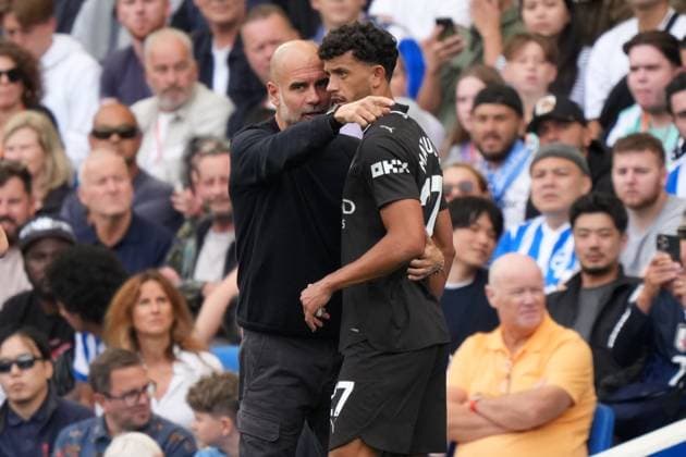 Brighton and Hove Albion v Manchester City, Premier League, Football, Amex Stadium, Brighton, UK - 31 Aug 2025 Pep Guardiola manager of Manchester City gives instructions to Matheus Nunes of Manchester City. Brighton Amex Stadium Brighton UK, UK NEWSPAPERS OUT Copyright: xSeanxRyanx