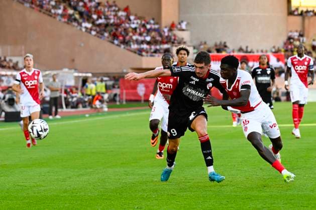 FOOTBALL : AS Monaco VS RC Strasbourg Alsace - Ligue 1 Mcdonald s - 31 08 2025 Joaquin Panichelli (RC Strasbourg) Lamine Camara (ASM) - Ligue 1 Mcdonald s match between AS Monaco and Racing Club de Strasbourg Alsace on August 31, 2025 at the Louis II Stadium in Monaco. MonacoMonaco  Copyright: xWilliamxCannarellax
