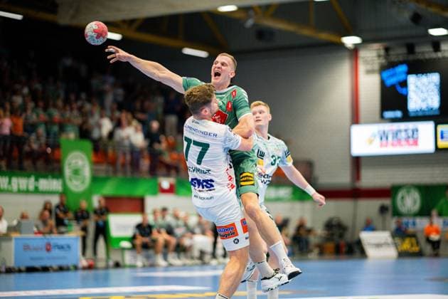 31.08.2025 - Handball, 2025 2026, 1. Bundesliga, 1. Spieltag, GWD Minden - Frisch auf Göppingen: (L-R) David Schmidt (Göppingen), Karolis Antanavicius (Minden)