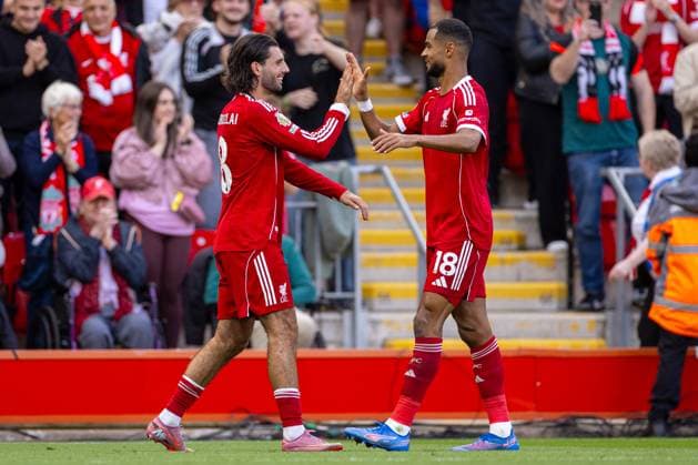 Football - FA Premier League - Liverpool FC v Arsenal FC LIVERPOOL, ENGLAND - Sunday, August 31, 2025: Liverpool s Dominik Szoboszlai celebrates after scoring the first goal with team-mate Cody Gakpo during the FA Premier League match between Liverpool FC and Arsenal FC at Anfield. (Photo by David Rawcliffe Propaganda) LIVERPOOL Anfield MERSEYSIDE ENGLAND  Copyright: xDavidxRawcliffex P2025-08-31-Liverpool_Arsenal-75