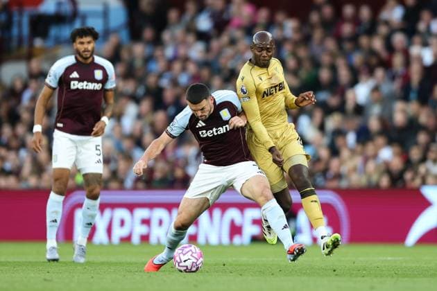 Birmingham, England, 31st August 2025. John McGinn of Aston Villa and Jean-Philippe Mateta of Crystal Palace battle for the ball during the Aston Villa vs Crystal Palace Premier League match at Villa Park, Birmingham. Picture credit should read: Jessica Hornby Sportimage EDITORIAL USE ONLY. No use with unauthorised audio, video, data, fixture lists, club league logos or live services. Online in-match use limited to 120 images, no video emulation. No use in betting, games or single club league player publications. SPI_038_JH_Villa_Palace SPI-4102-0038